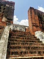 Old red brick staircase background photo