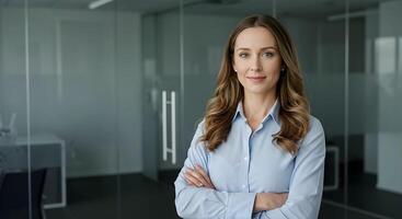 Confident Professional Woman Standing in Modern Office Environment photo