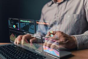 man use laptop with growth graph and progress of business and analyze finance, and investment.Use technology to plan strategy to success goals and growth stock.online business, online marketing. photo