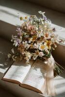 Flowers and book on stairs photo