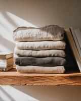 Stack of linen on a shelf photo