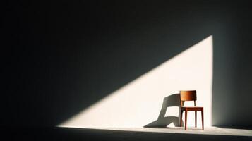 A chair in a room with a wall and a light photo
