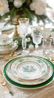 Elegant holiday table setting with gold accents and crystal glassware photo