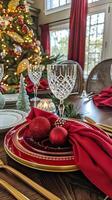 Elegant christmas dining table setting with red accents and festive decor photo