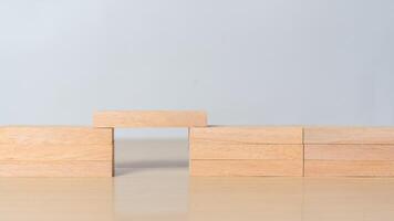 Wooden blocks forming a bridge. Concept of problem solving, connection, teamwork, and building solutions in business and strategy. photo