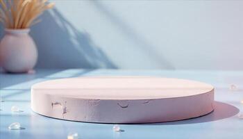 A pink round podium with cracked texture on a blue surface, with a background divided in blue and pink, and some light spots photo