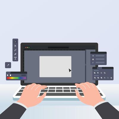 Creative graphic designer working on laptop keyboard