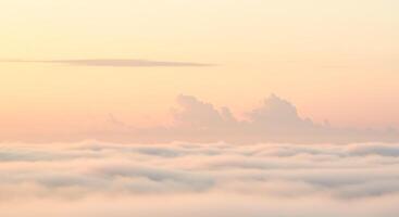 A view of the clouds from above the clouds photo