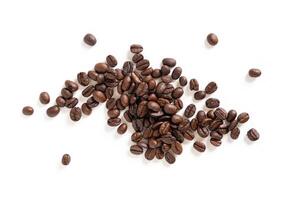 Brown roasted coffee beans seeds. Isolated of coffee bean on white background. Close up image. photo