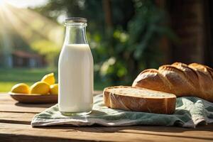 Milk and bread on a wooden table with sunlight photo