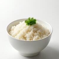 Fresh Cooked White Rice Bowl with Green Garnish on Neutral Background photo