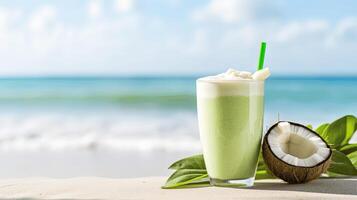 Refreshing Coconut Smoothie on a Beach with Clear Ocean Background photo