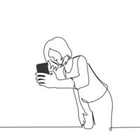 woman leaning over holding phone and taking selfie with something in background - one line art . concept of selfie with object or landscape vector