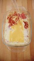Melted Cheese on Fork in a Glass Container video