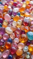 Colorful Varied Smooth Polished Gems and Decorative Stones Display photo