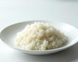 Steaming White Rice in a Simple Bowl on a Clean Surface photo