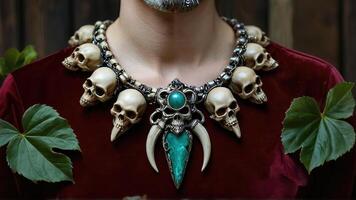 Intricate Skull Necklace with Gemstone on Velvet Background photo