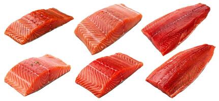 set from lightly smoked atlantic salmon and slightly salted trout red fish fillet pieces isolated on white background photo