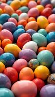 Vibrant Colorful Eggs in Various Sizes and Patterns on a Surface photo