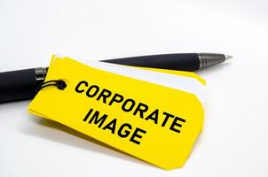 Corporate image label repeated on yellow sticky paper emphasizing reputation and professionalism. photo