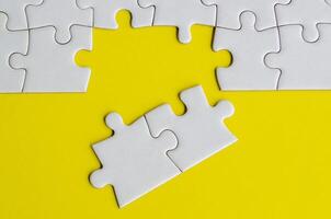 A simple yet powerful image of puzzle parts representing solutions unity and purposeful connection photo
