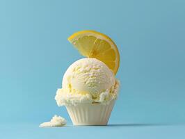 Lemon ice cream with a slice of lemon, blue background photo