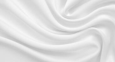 Elegant flowing white silk fabric with soft folds and subtle light patterns photo
