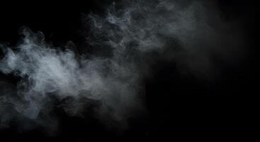 Ethereal vapor cloud on a contrasting black background, creating a mystic effect photo