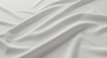 Subtle waves of flowing white silk fabric create a soft, luminous background photo