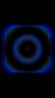 A black background with a blue circle in the center video