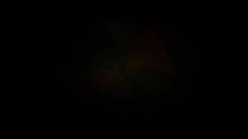 a black background with a green light video