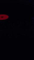 a red disk is in the middle of a black space video