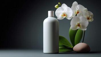 A simple and elegant cosmetic bottle stands on a geometric podium. It is accompanied by delicate orchid flowers and smooth stones, creating a serene and sophisticated display. photo