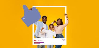 A happy family, featuring two adults and a child, enthusiastically showing thumbs up against a bright yellow background. Their excitement promotes positivity in online sharing. photo