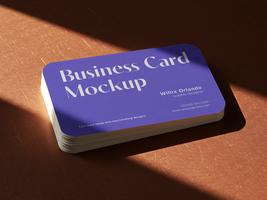 Stacked Horizontal Business Card Mockup with Soft Shadows on Copper Surface psd