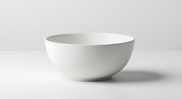 A white bowl sitting on a table photo