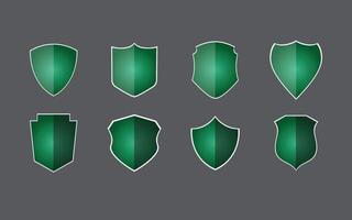 Emerald shield assets, set of modern green shield assets vector