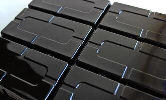 Glossy plastic surface with rectangular sectors photo