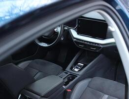 View From Opened Rear Door On A Front Seats Trimmed With Alcantara And Black Leather In Premium Class Car Interior photo