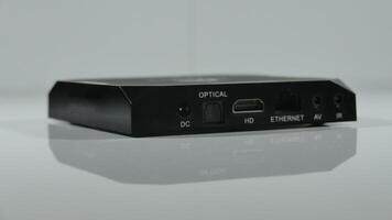 Flat TV set-top box with HDMI, power and network sockets photo