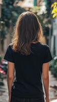 Woman walking city alleyway with back view, and urban scene. photo