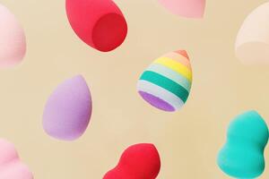 Pattern from color cosmetic beauty blender sponges Flying colored sponges different shape. photo