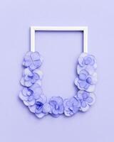 Plain natural Hydrangea flowers, minimal floral style pastel violet blossom arrangement. Flowery frame photo