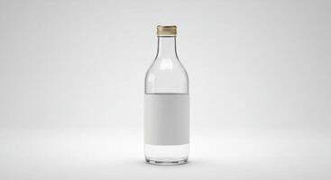 Elegant clear glass bottle with blank label and golden cap, isolated view photo