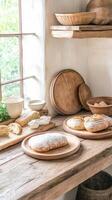Visitors enjoy baking fresh bread using old-fashioned methods in a charming rustic kitchen photo
