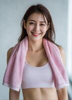 Fitness journey young woman exercising in modern gym motivational portrait bright environment close-up photo