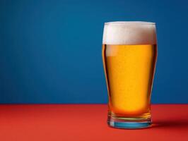 Refreshing beer glass with thick froth on colorful background relaxed setting close-up view photo