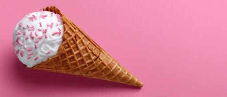 Delightful ice cream cone on pastel pink background playful food photography photo