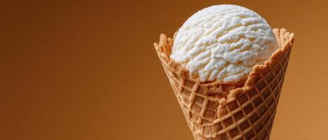 Delicious vanilla ice cream in waffle cone beige background food photography photo