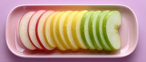 Colorful apple slices fan arrangement on white ceramic plate minimalist aesthetic photo